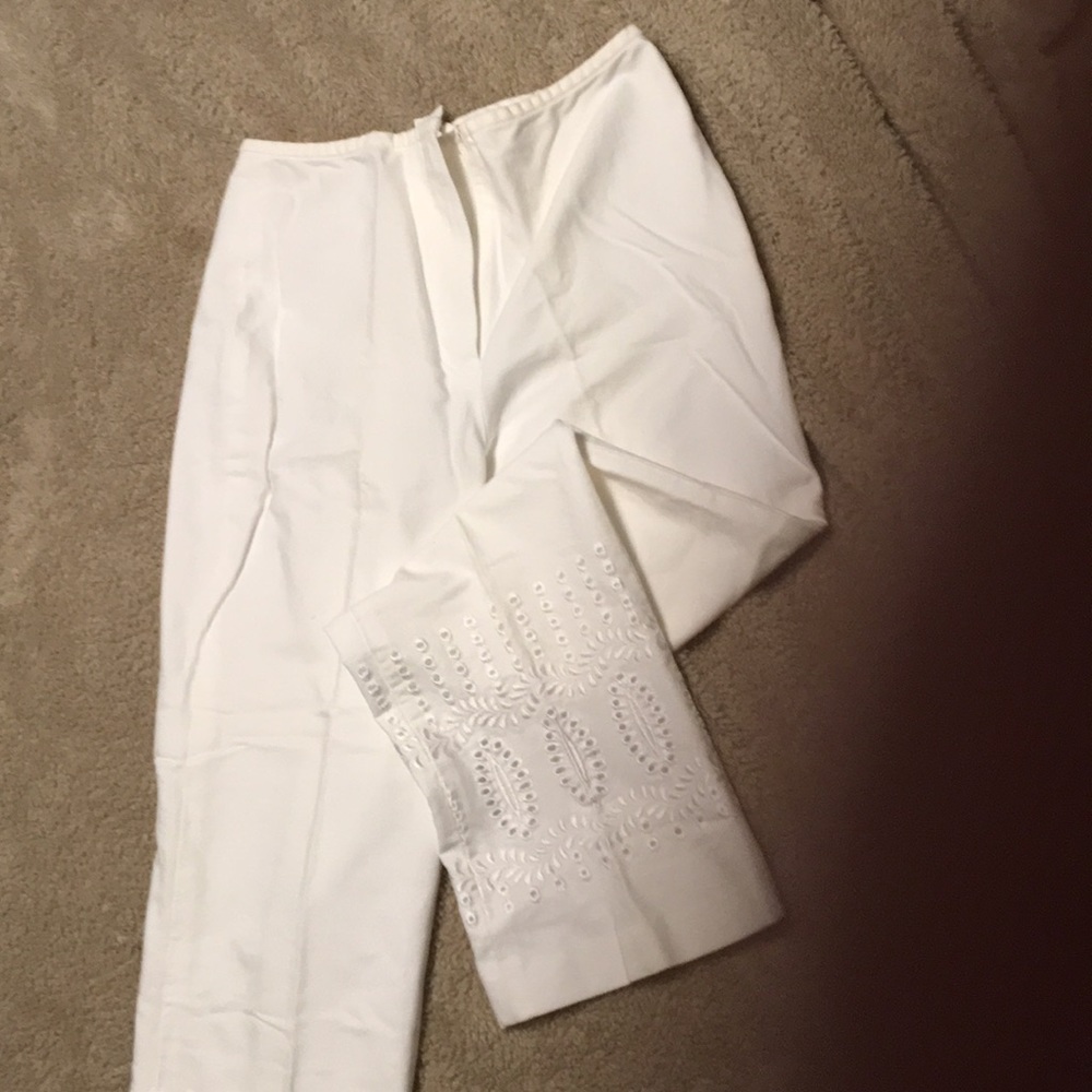 Cropped pants w beautiful embroidery at ankles.